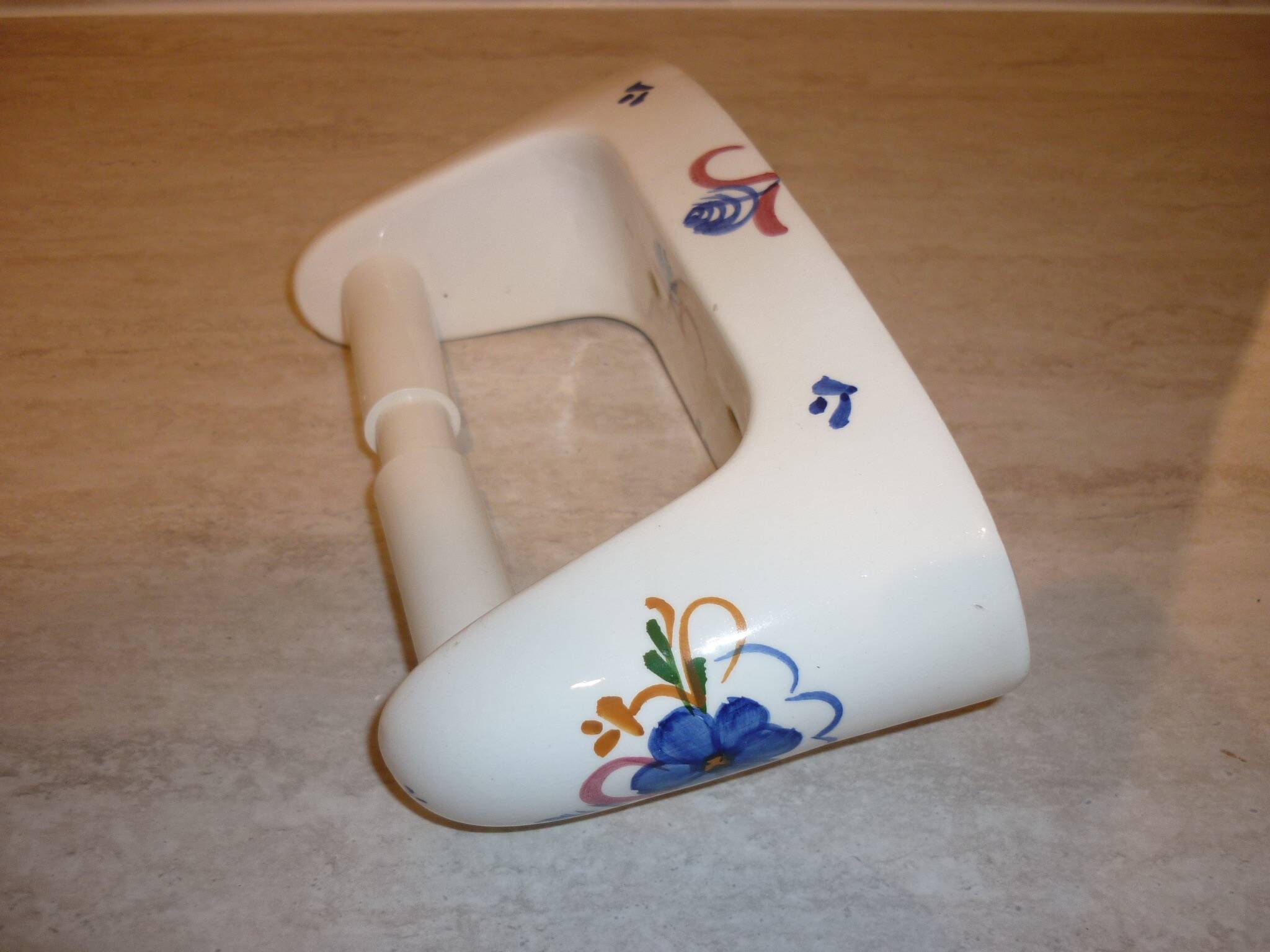 Wall-mounted ceramic toilet paper dispenser