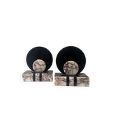 Art Deco bookends with a circular design in black and pink marble.