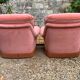 Pair of pink tufted velvet frog chairs from the 1970s.