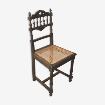 Old style ebony wooden chair
