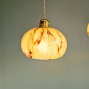 Trio of Art Deco pendant lights in marbled opaline glass, 1920s-30s