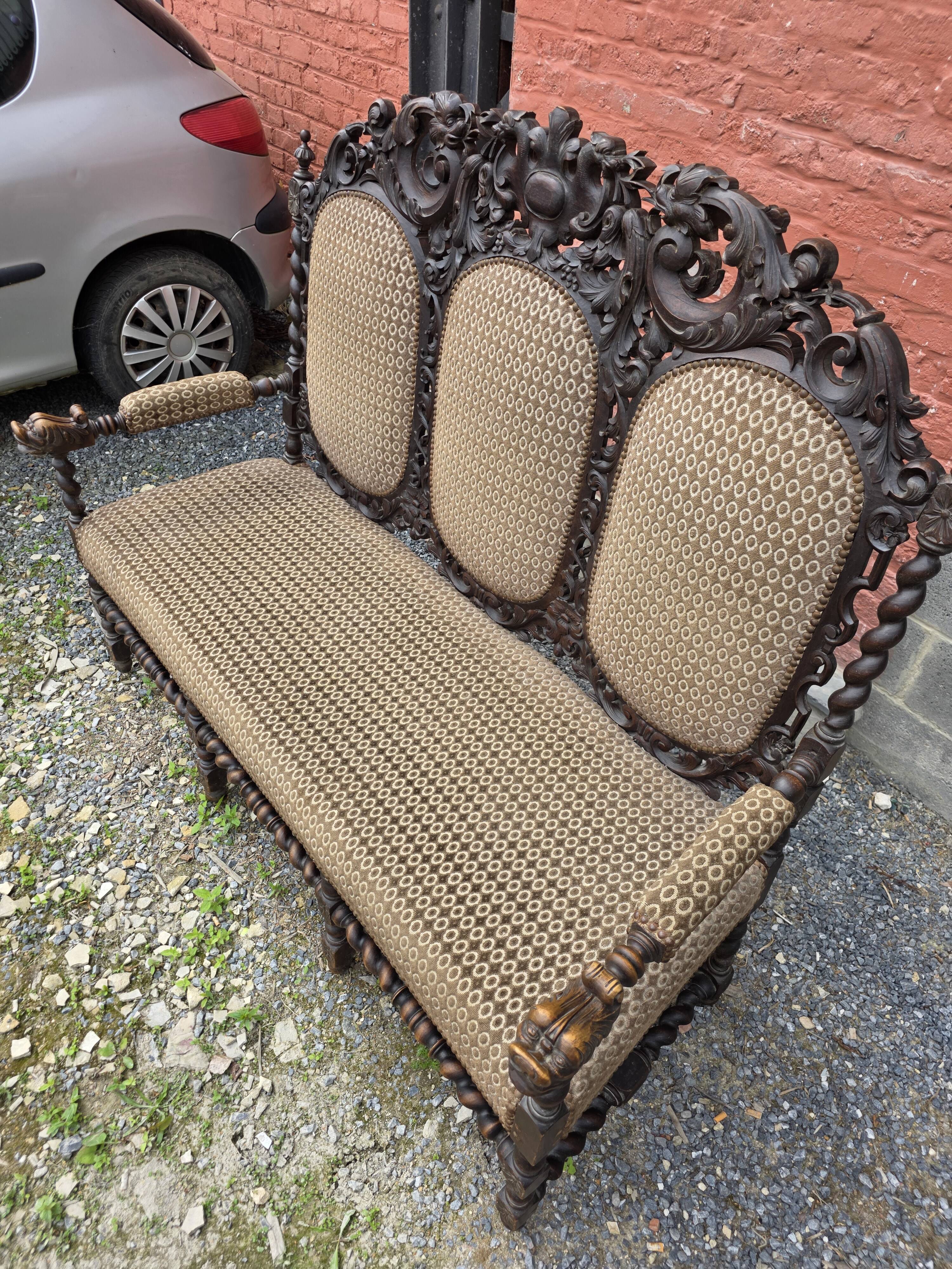 Three-seater armchair in Louis XIII style made of oak from the 19th century.