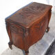 Old chest, carved wooden chest, curved chest on wheels, interior decoration