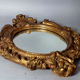 Oval mirror gilded stucco wood