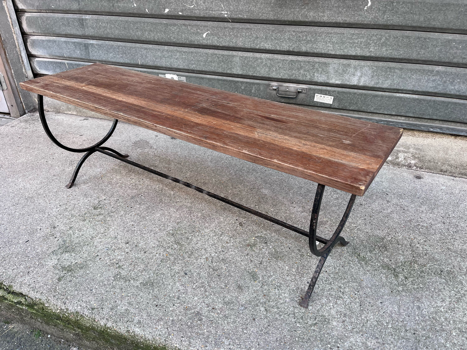 Rustic oak wrought iron bench