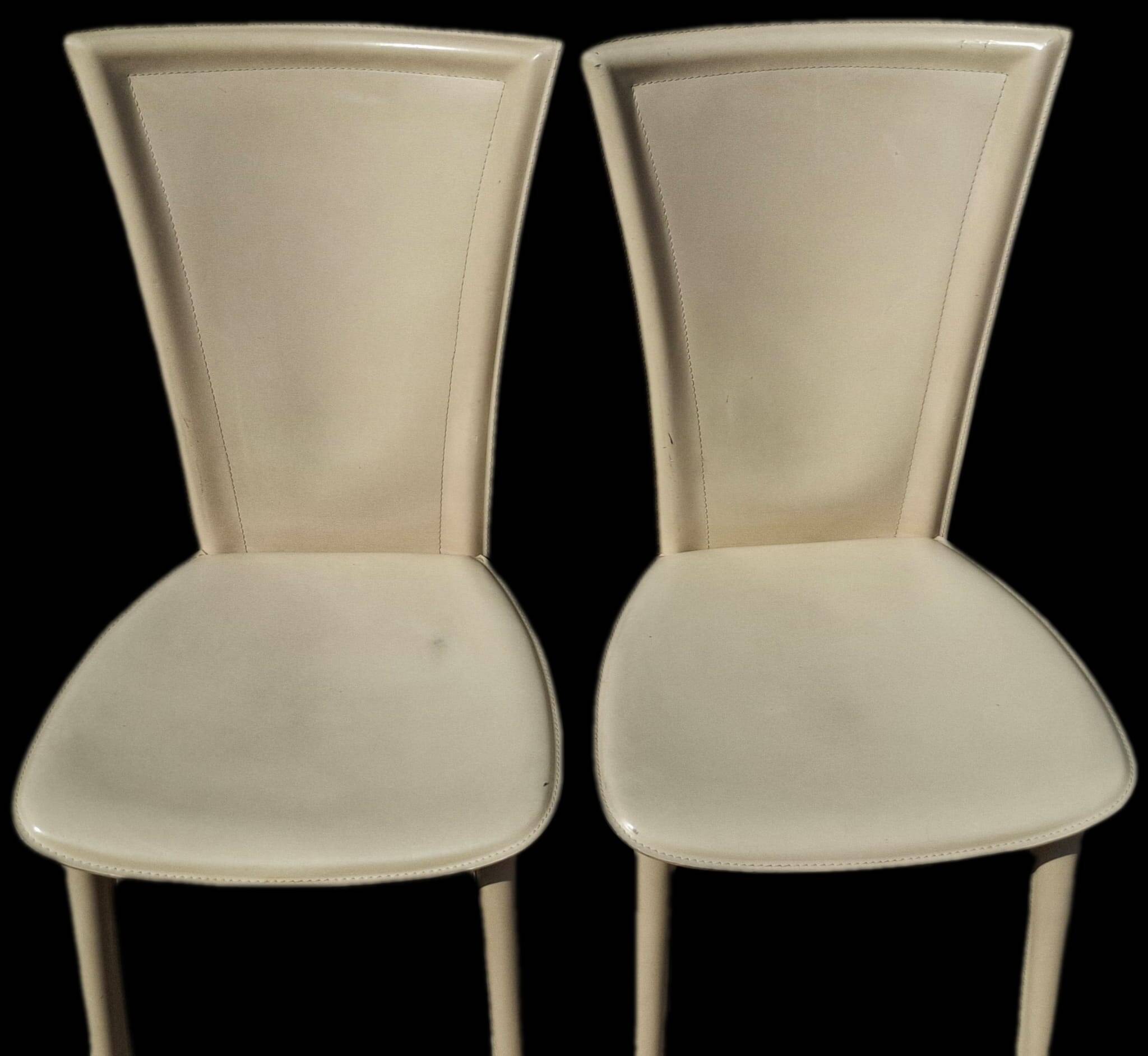 2 vintage leather chairs from Italy