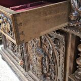 Two-body buffet in solid oak, richly carved in the Renaissance style.
