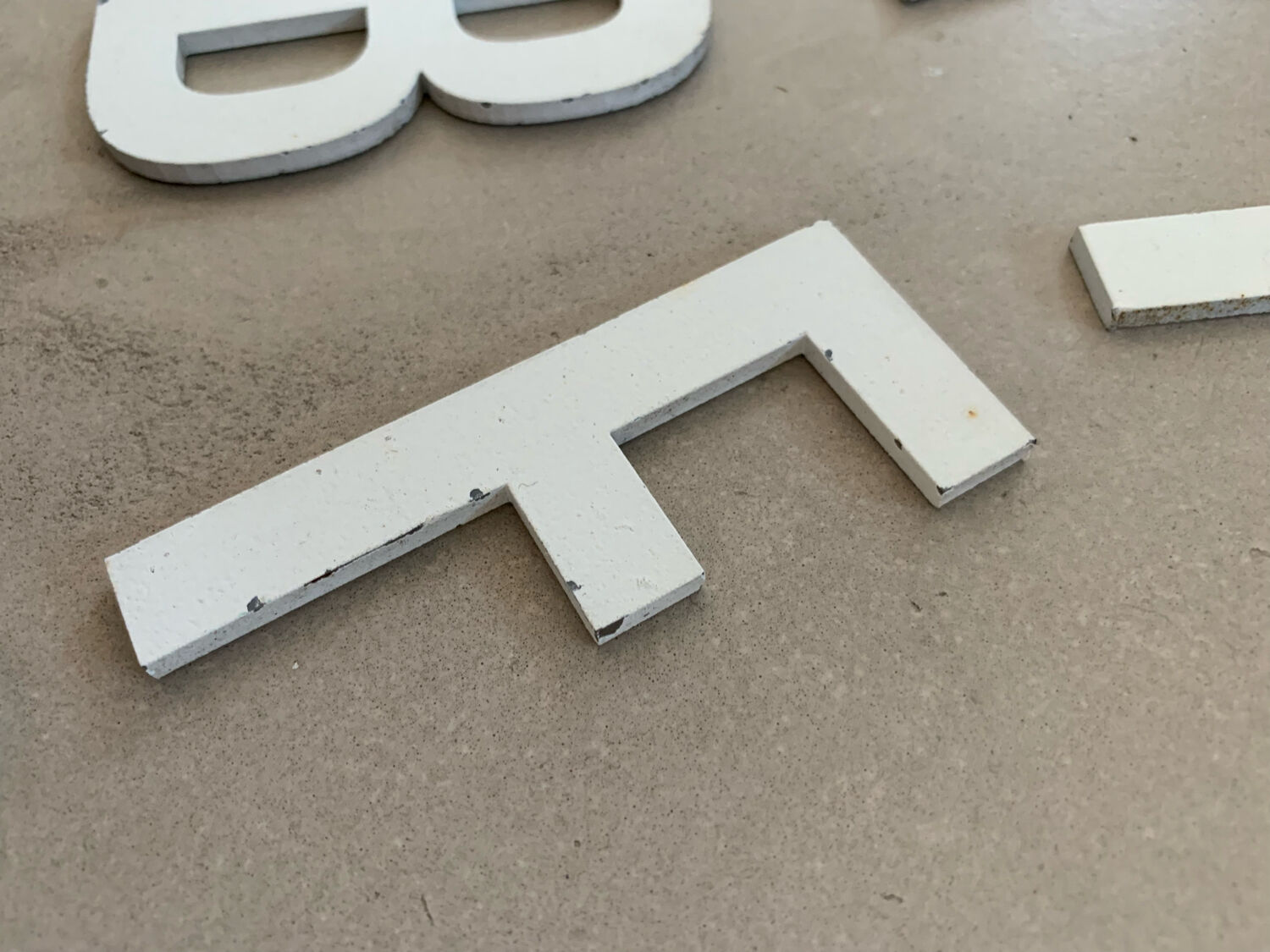 Set of 11 small old sign letters
