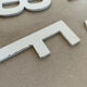 Set of 11 small old sign letters