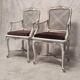 Paire de fauteuils cannés de style régence - bois peint - 19ème
