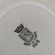 Set of 8 ironstone plates with coordinated designs.