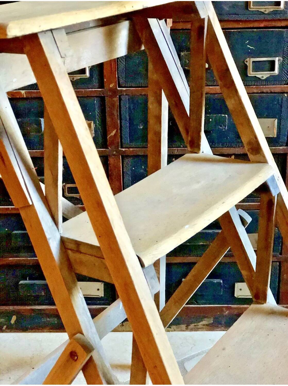 Old small painter's stepladder, wooden trade furniture, step stool
