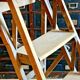 Old small painter's stepladder, wooden trade furniture, step stool