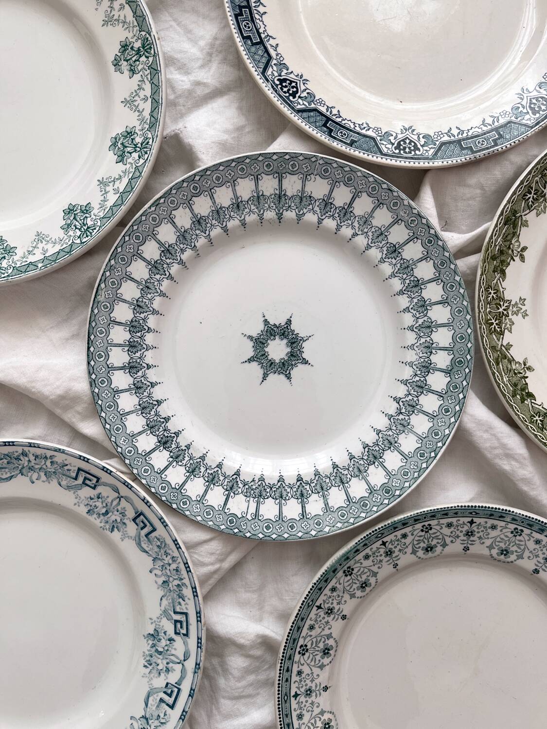 6 mismatched Saint Amand ironstone flat plates