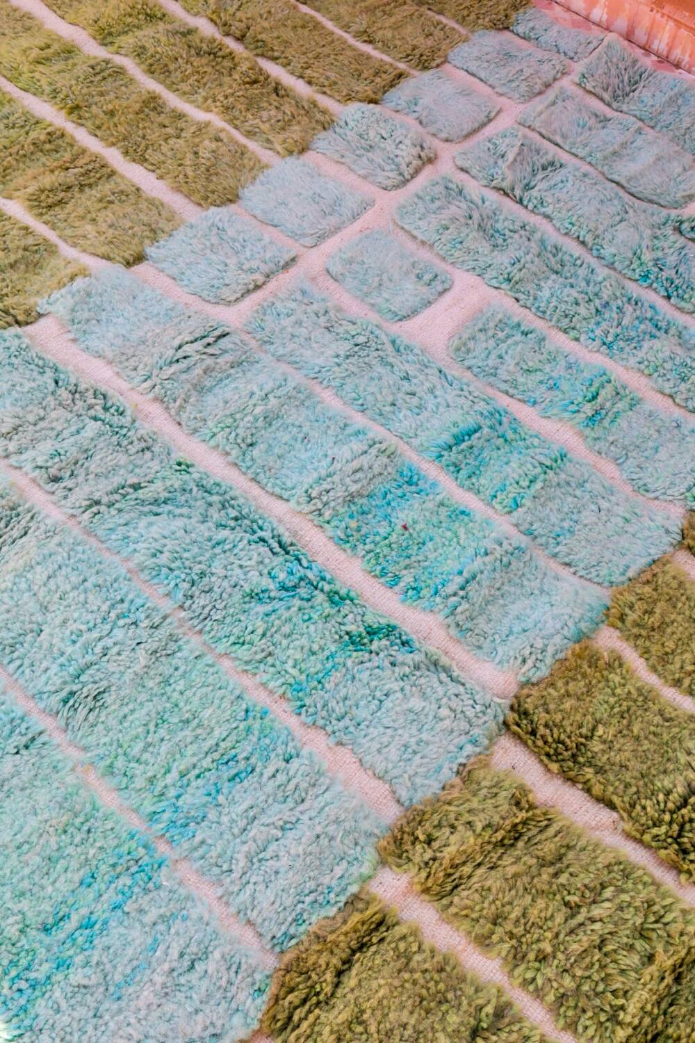 Almond green and blue green Moroccan rug with modern reliefs
