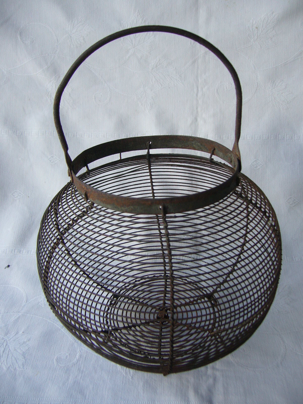 Old metal round salad basket