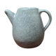 Small ceramic pitcher enamelled pale green, signed Max Idlas