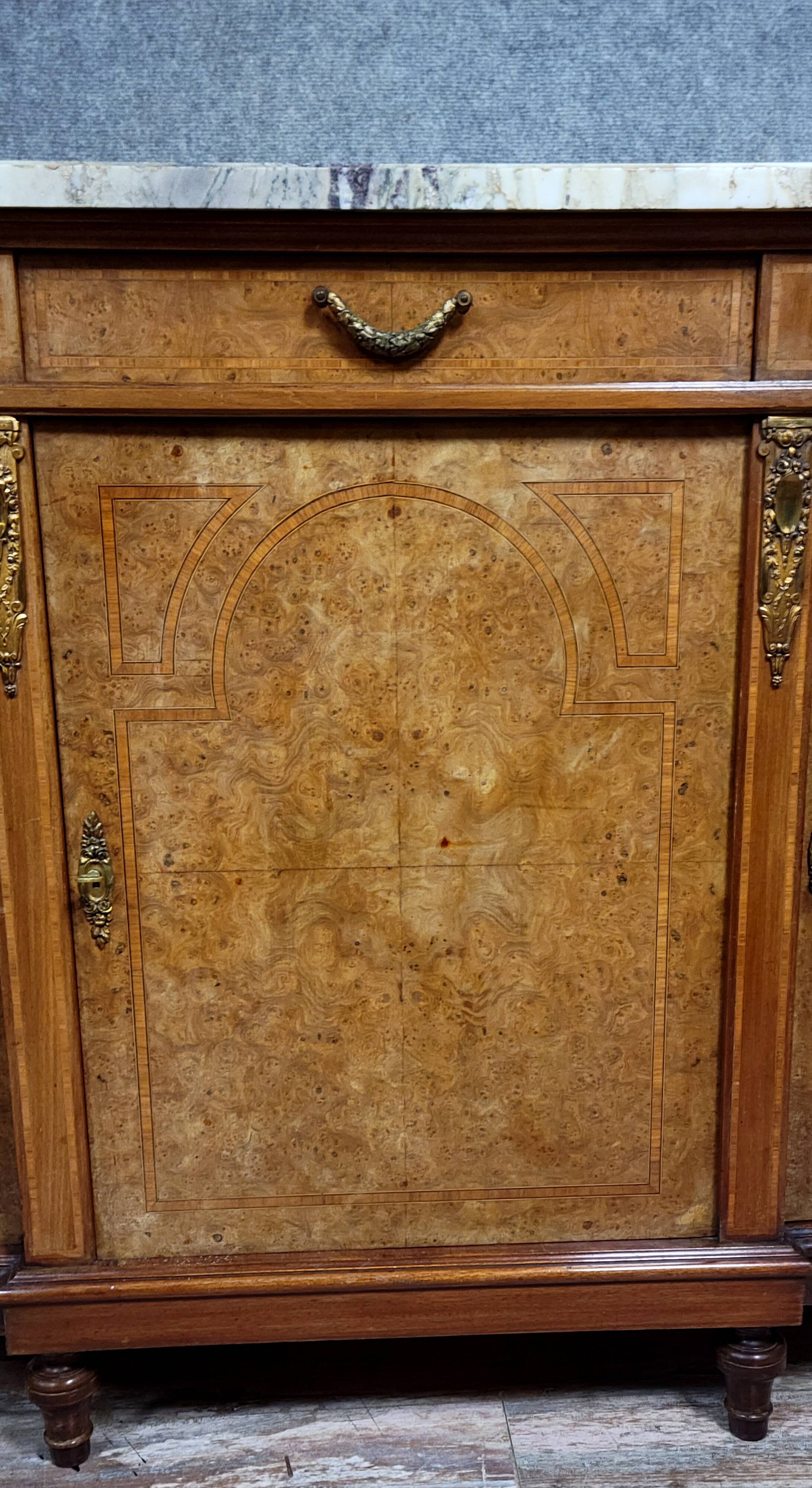 Half-moon buffet in Louis XVI style with burl and marquetry.