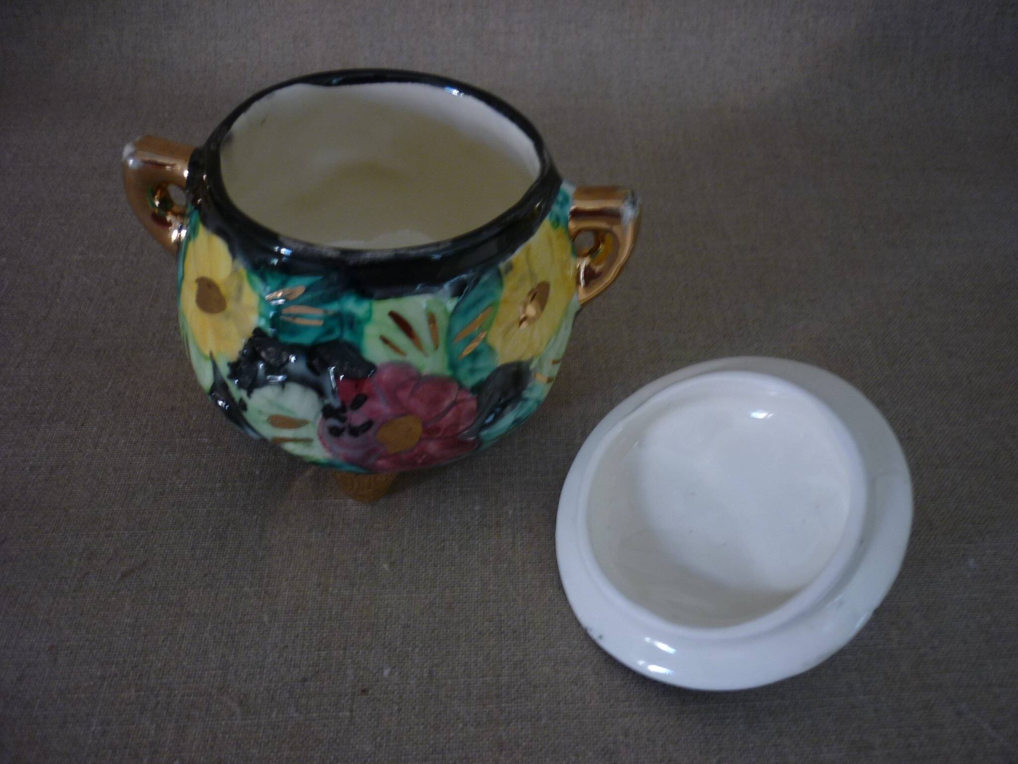 Multicolored ceramic covered tripod pot