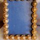 Pair of art deco photo frames in gilded bronze and gilded brass