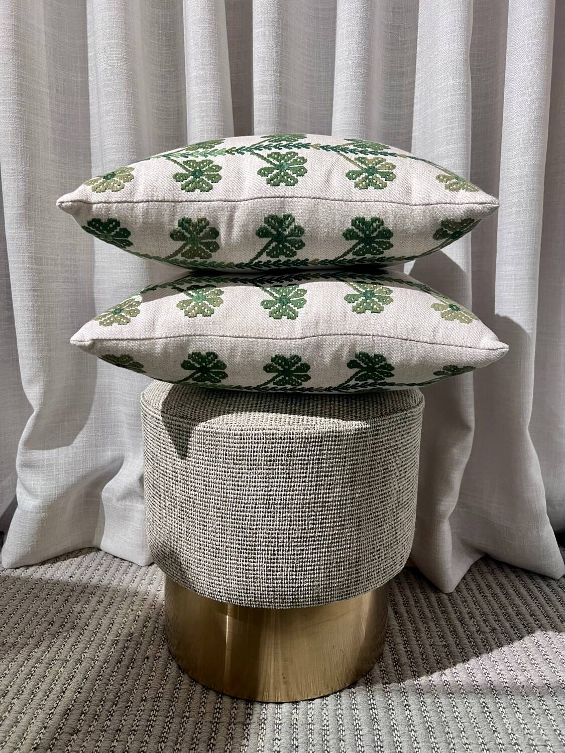 Custom cushions with green clover patterns.