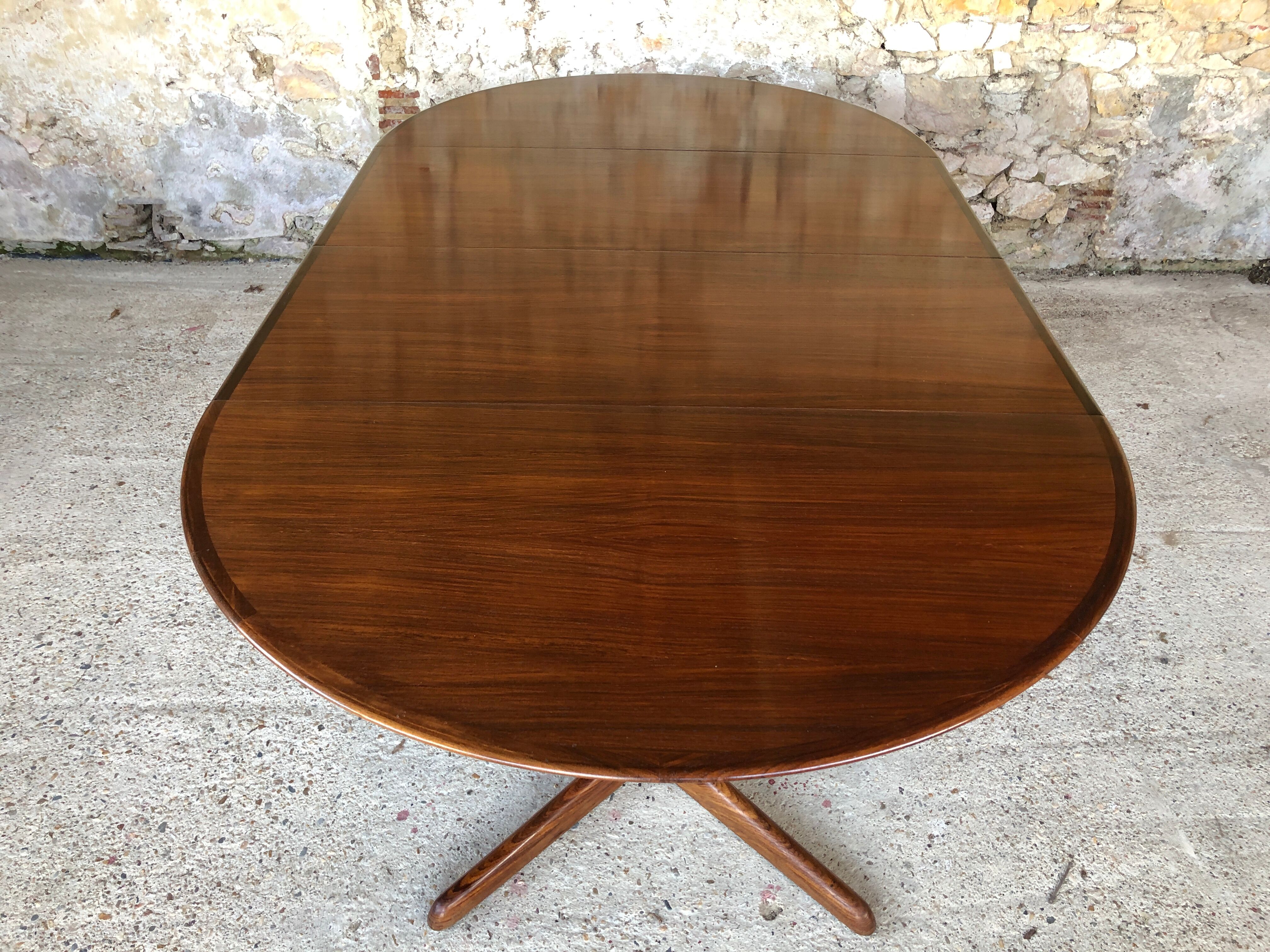 Expandable Scandinavian rosewood dining table by CJ Rosengaarden, circa 60's