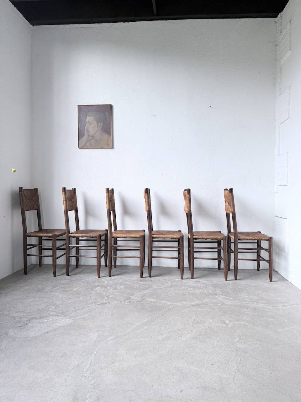 Set of 6 straw and oak Beauche chairs.