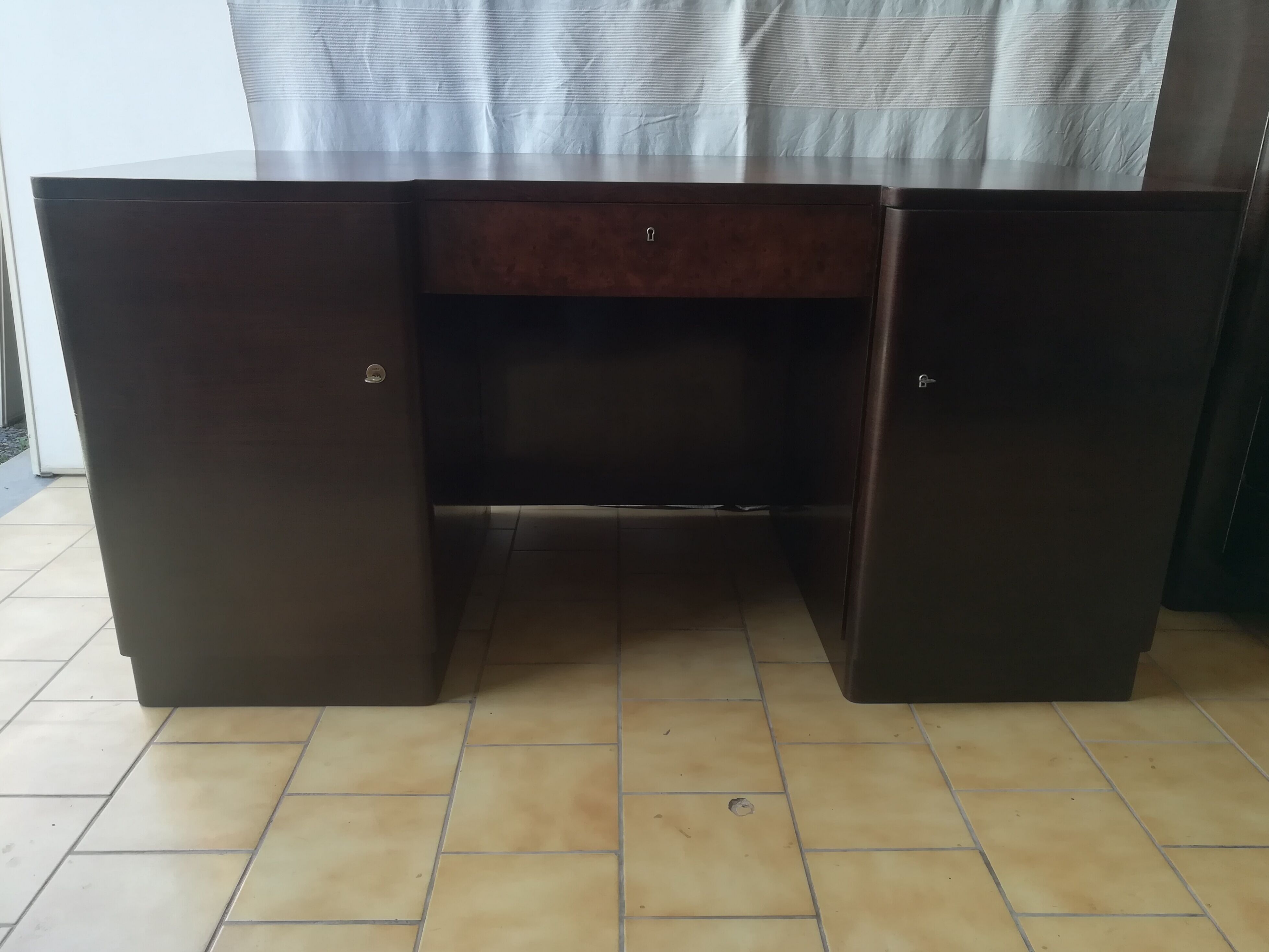 Art deco desk in rosewood and magnifying glass