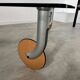 Vintage 90s design glass coffee table on casters