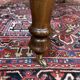 Victorian-style mahogany English table with 3 extensions.