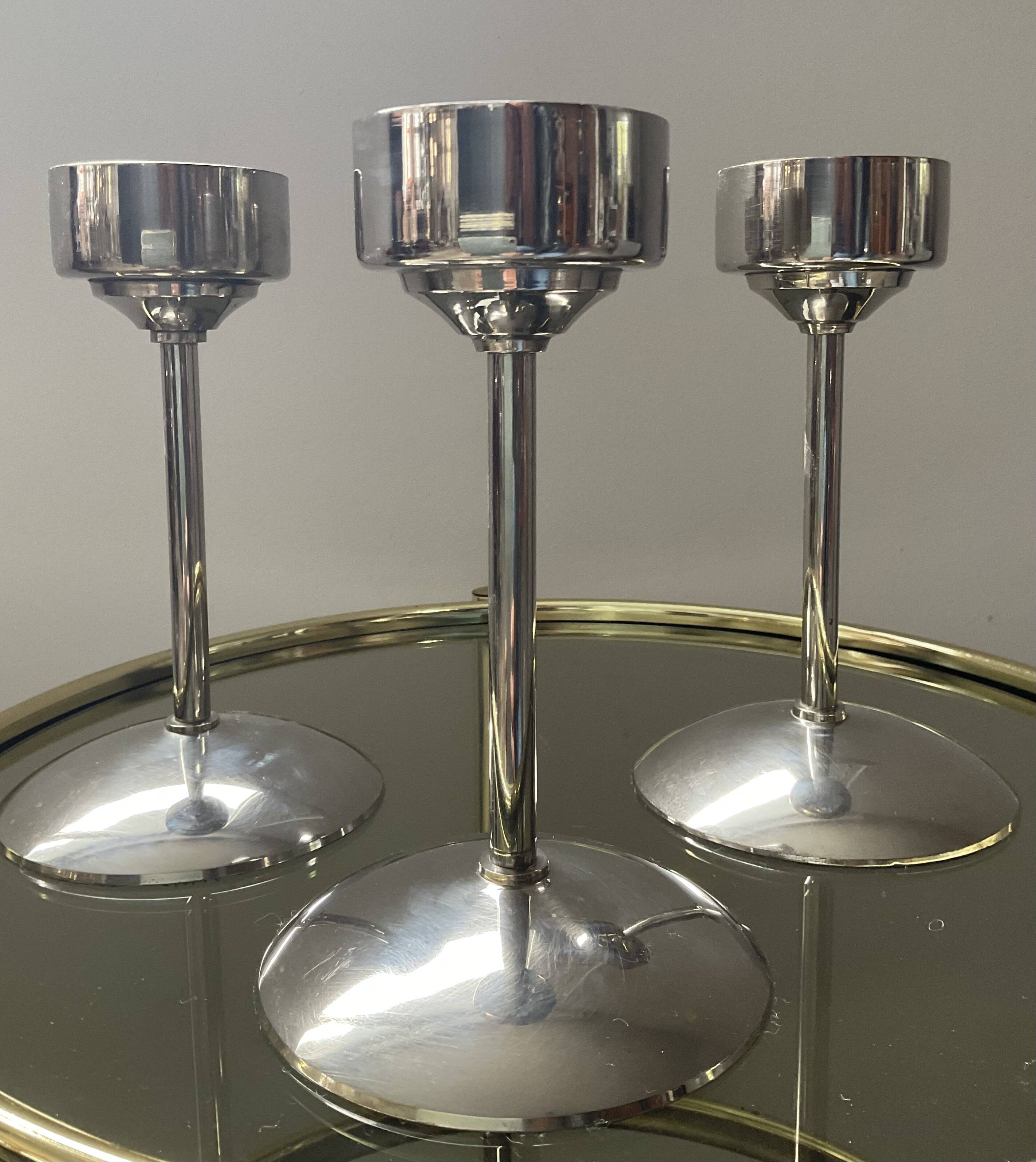 Série de 3 bougeoirs Art Déco en laiton argenté