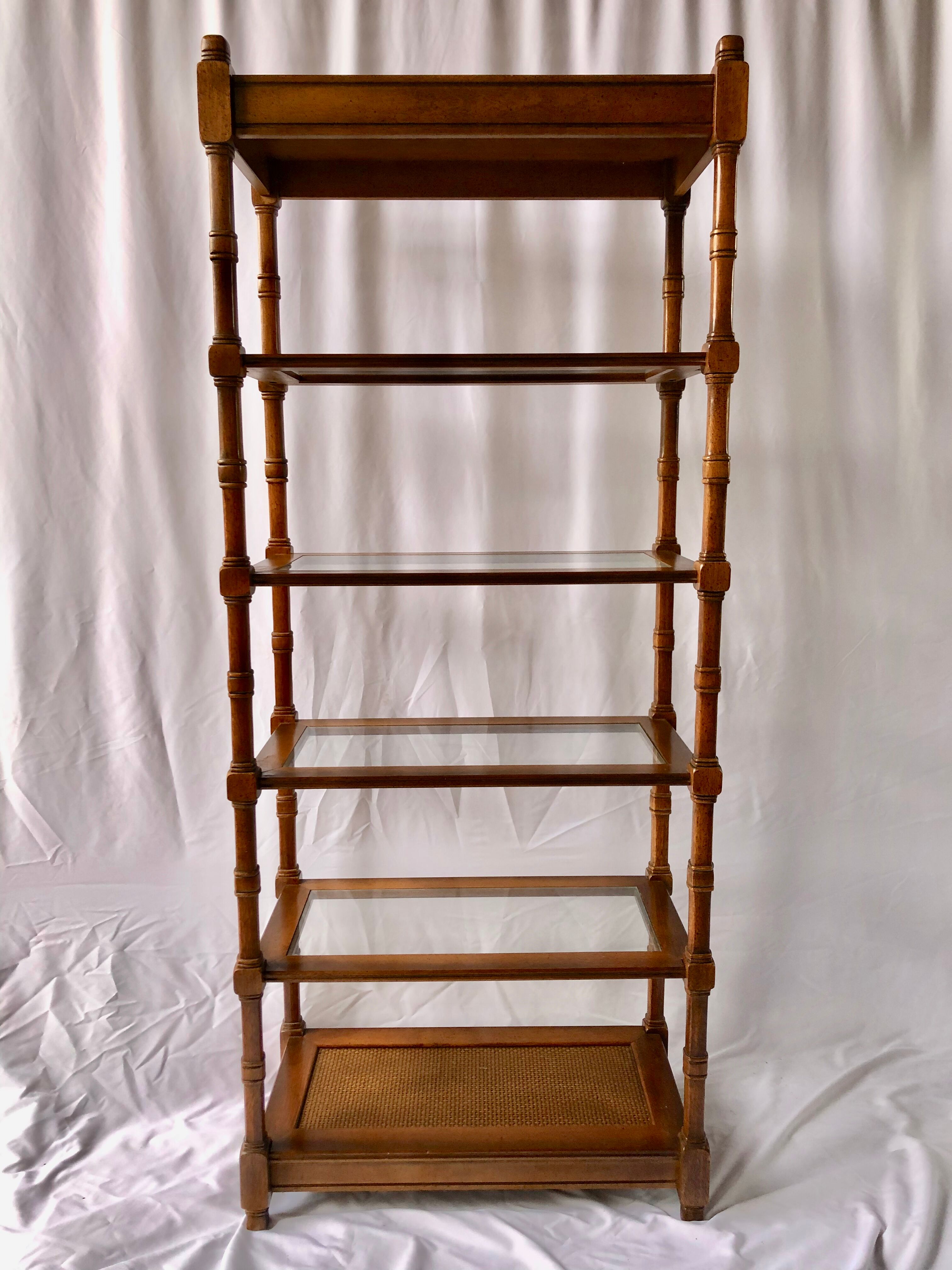Classic wooden shelves, glass tops and cannage