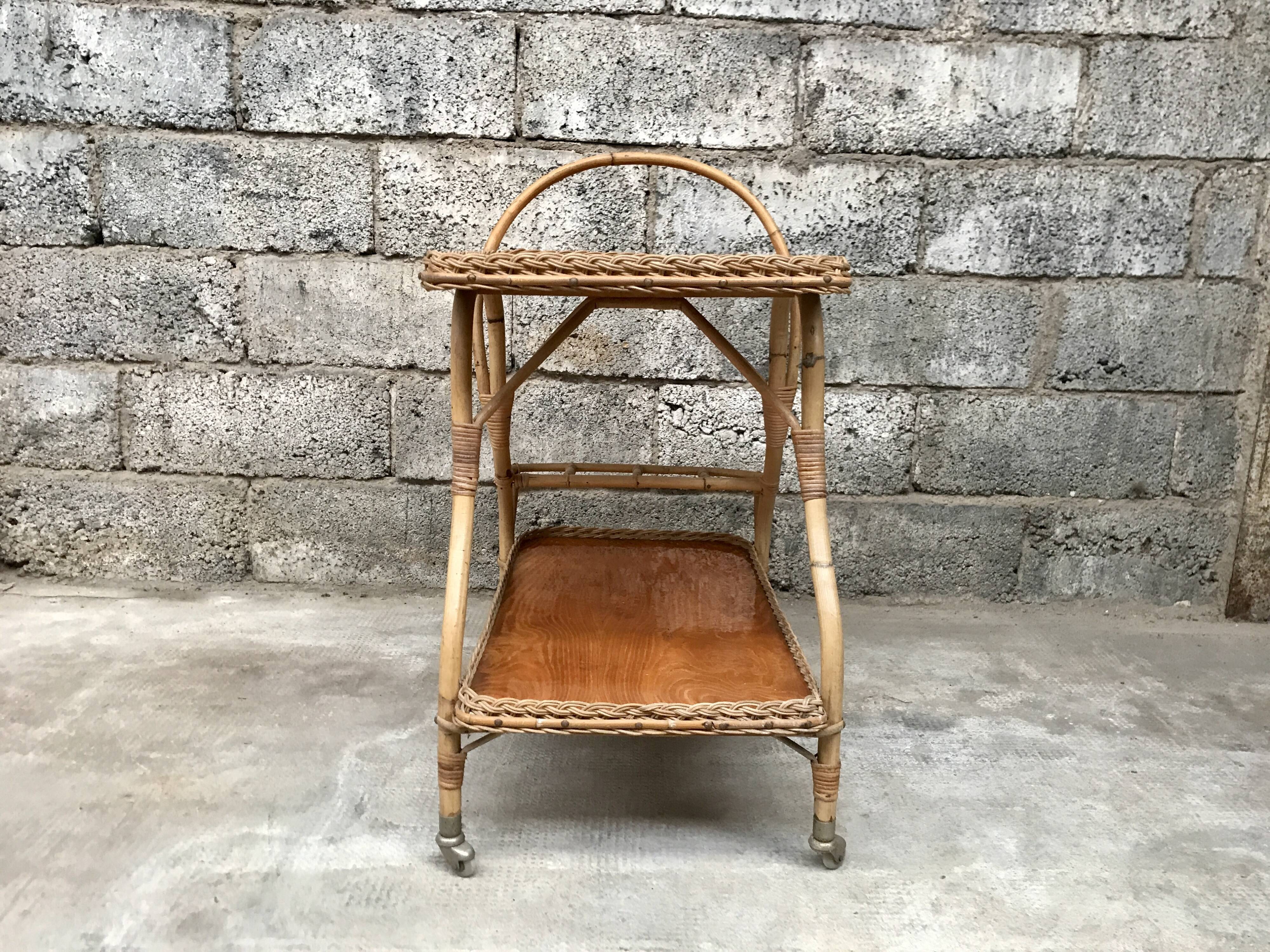 Rolling dessert in woven wicker bamboo rattan with 1950 bottle holder