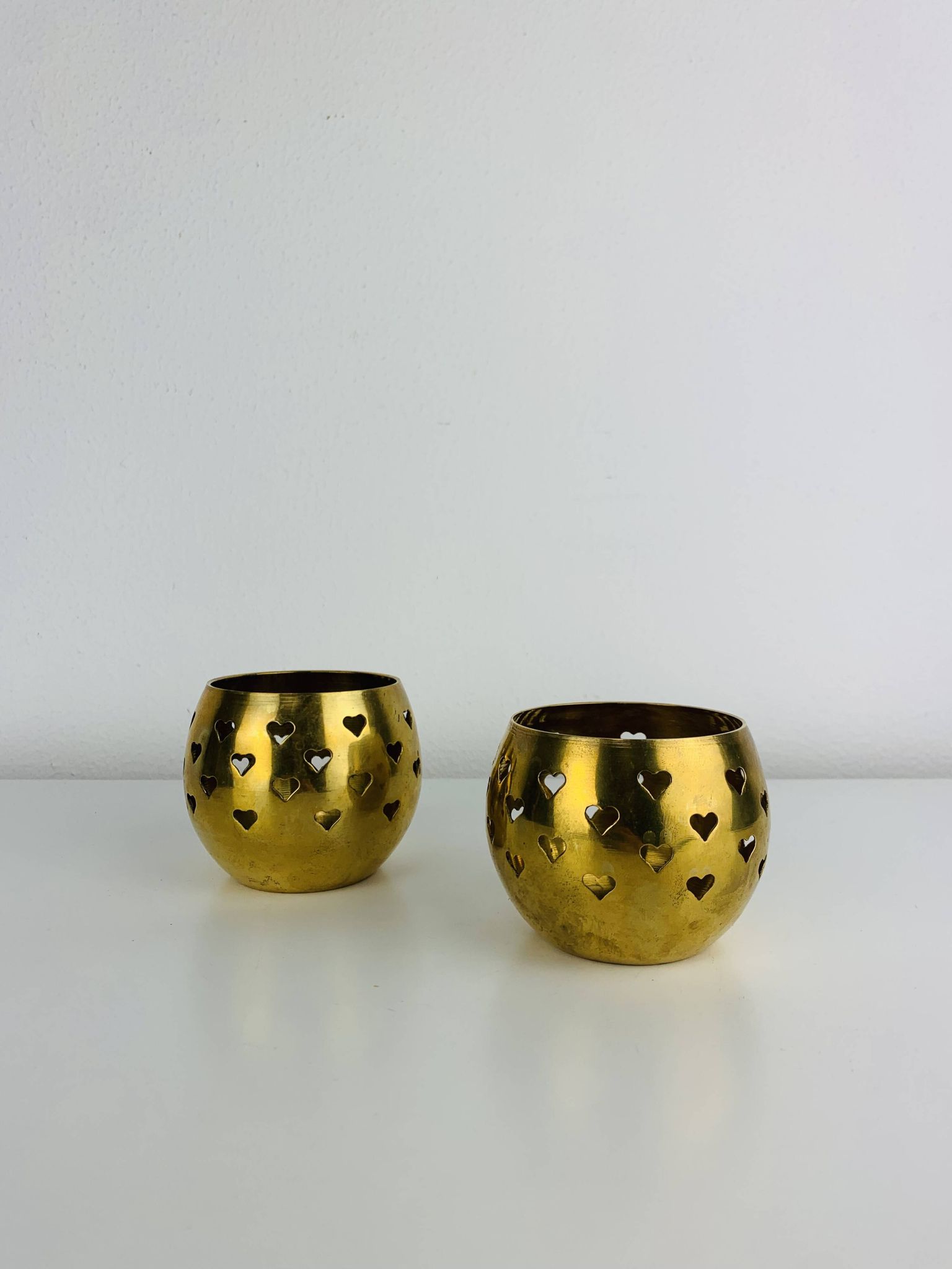 Pair of vintage openwork brass candle holders/votive candlesticks, gilded