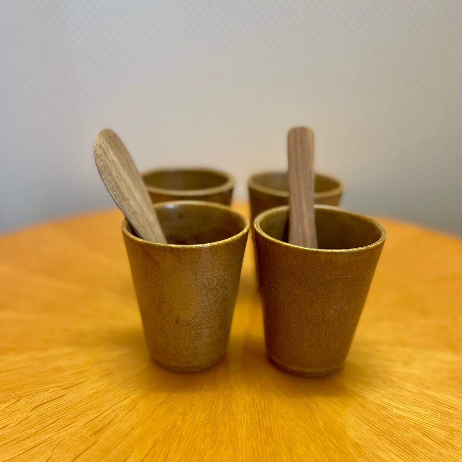 Set of 4 Digoin stoneware cups, glasses and wooden spoons