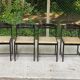 4 black solid wood and beige leather chairs from the 80s