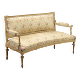 Antique neoclassical canapé in carved wood from the 19th century.
