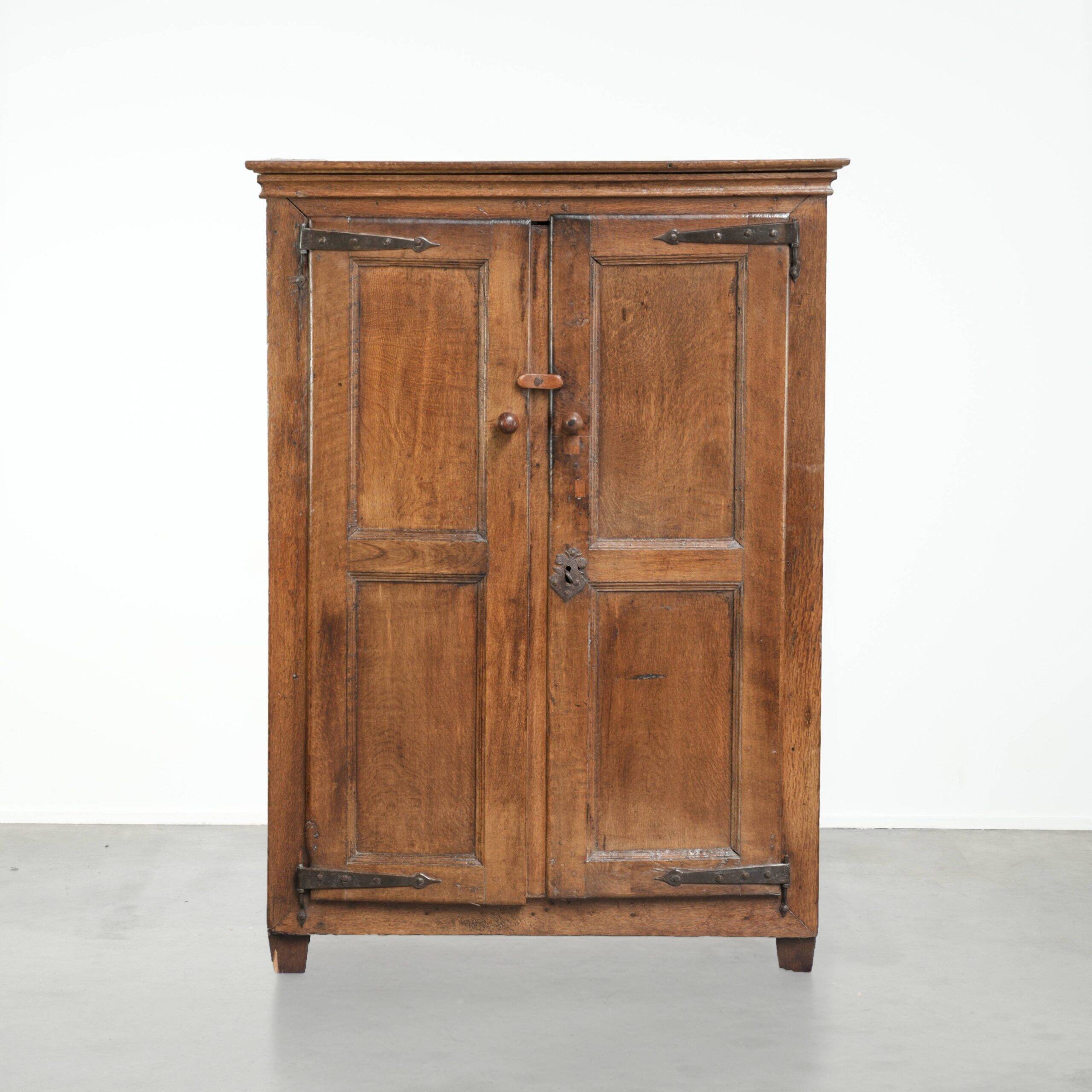 Antique oak farmhouse cupboard from the 17th century with original fittings
