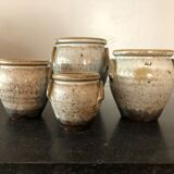 Set of 4 enamelled sandstone pots