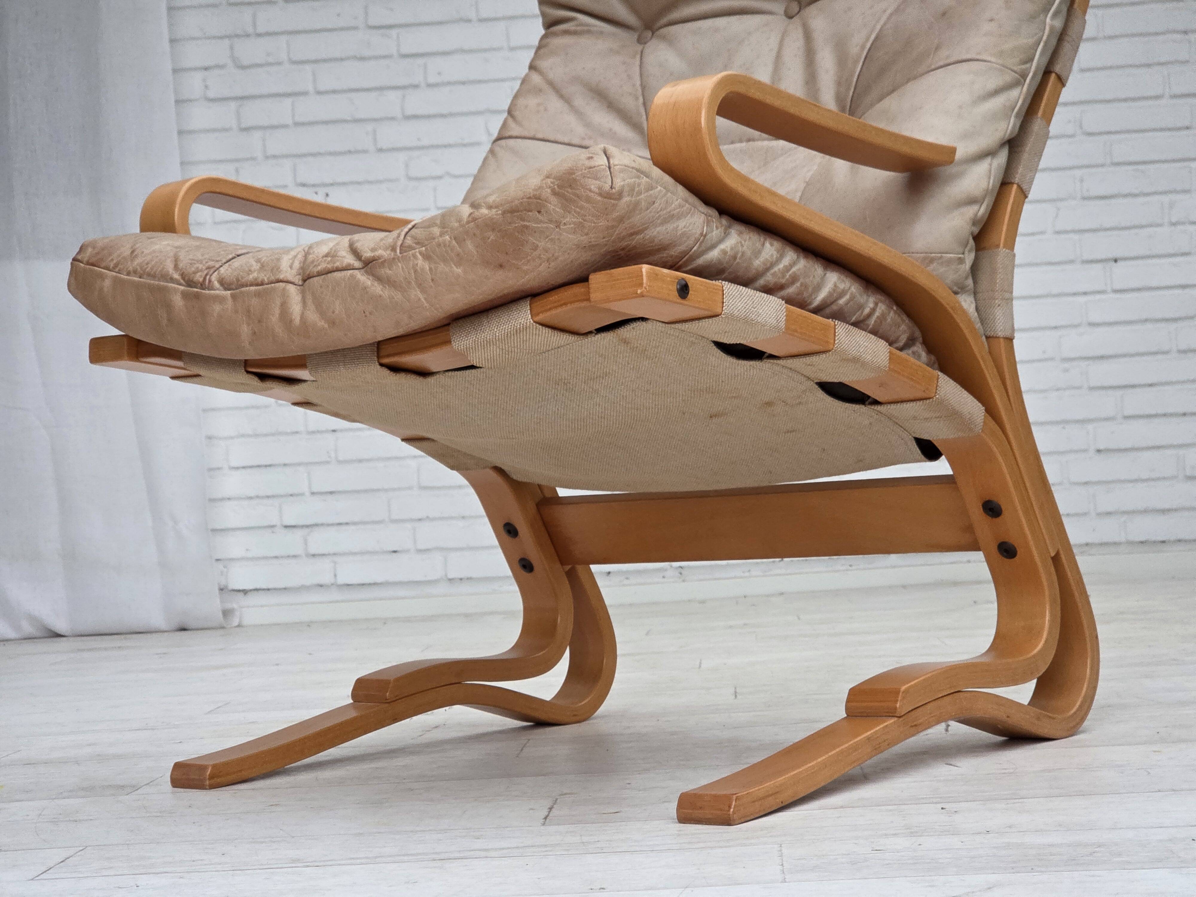 1970s, Norwegian armchair, model "Kengu", beige furniture leather.