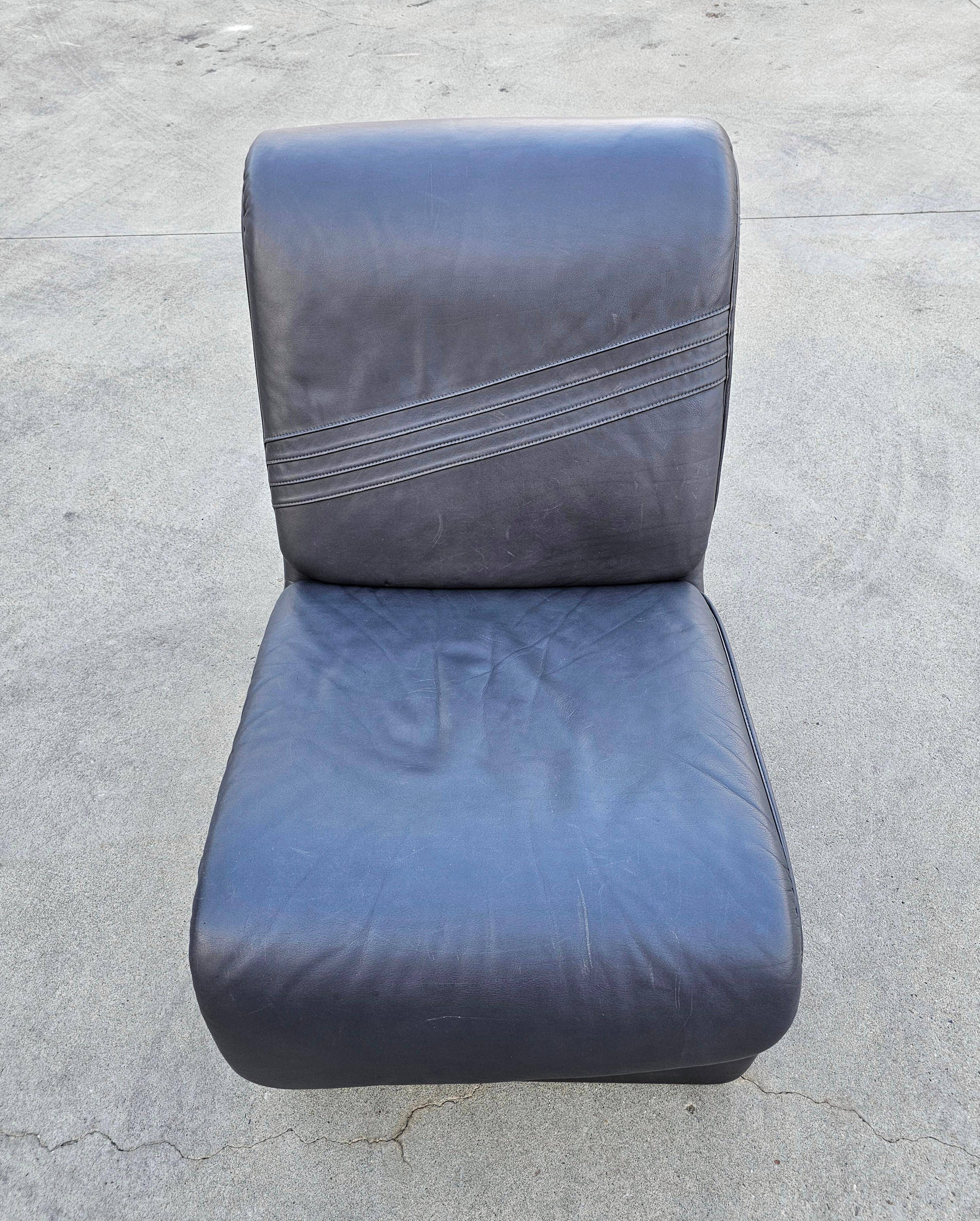Postmodern leather lounge chairs in the style of Etienne Fermigier 1978.