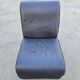 Postmodern leather lounge chairs in the style of Etienne Fermigier 1978.