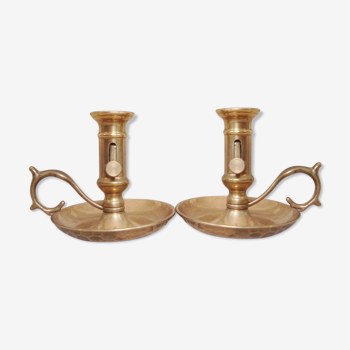 Pair of brass cellar rat candlesticks