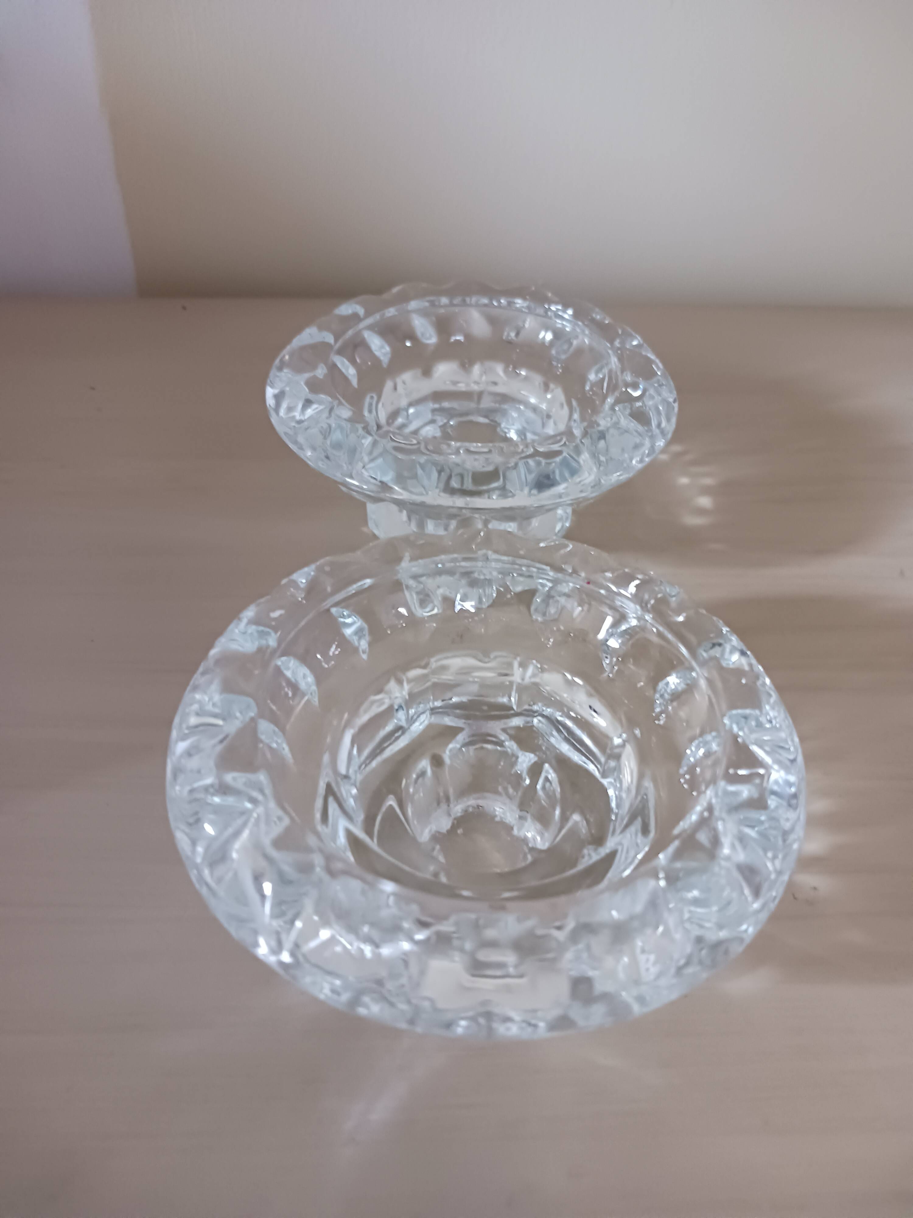 Moulded glass candle holders.