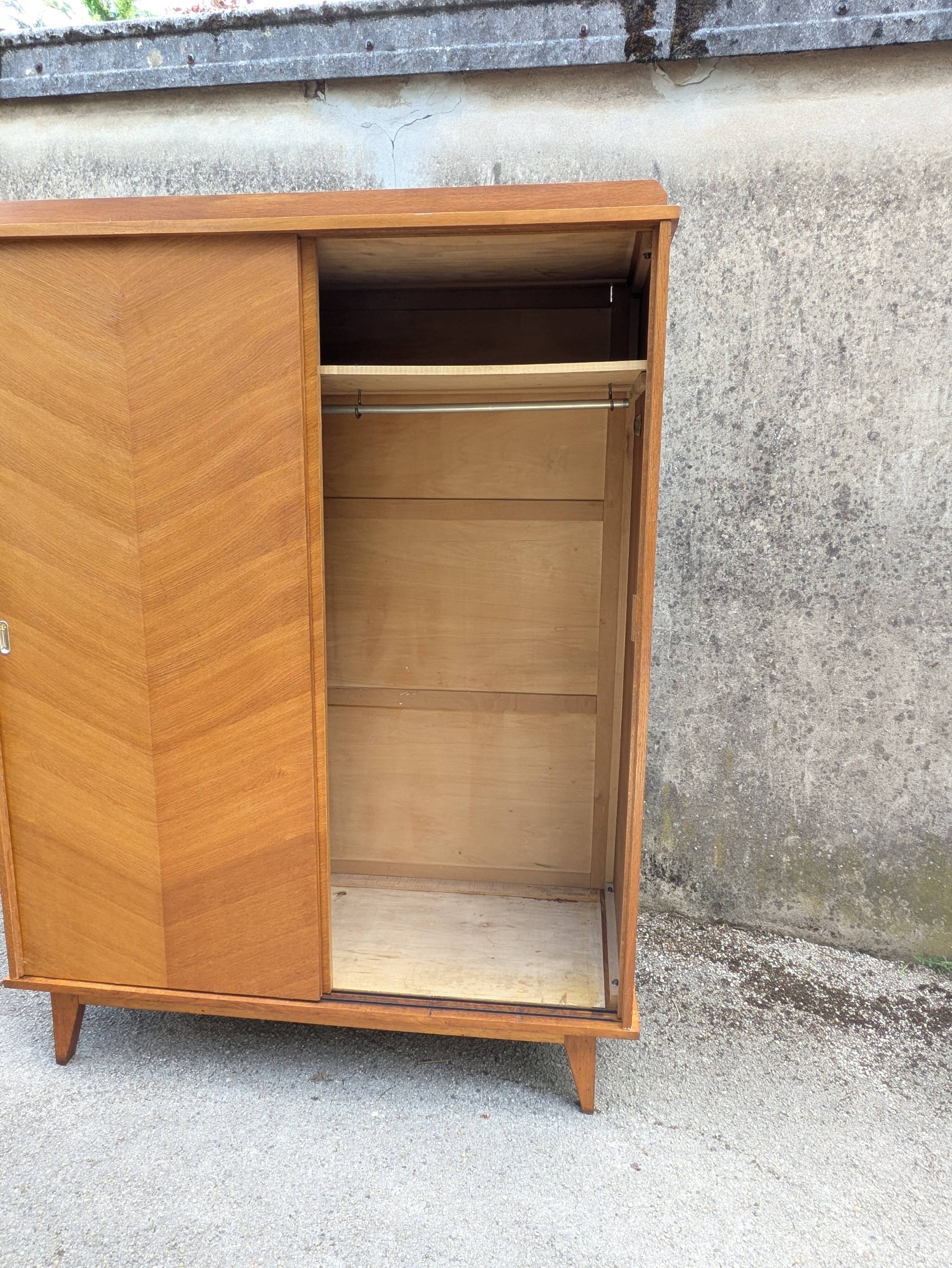 Vintage wardrobe with sliding doors