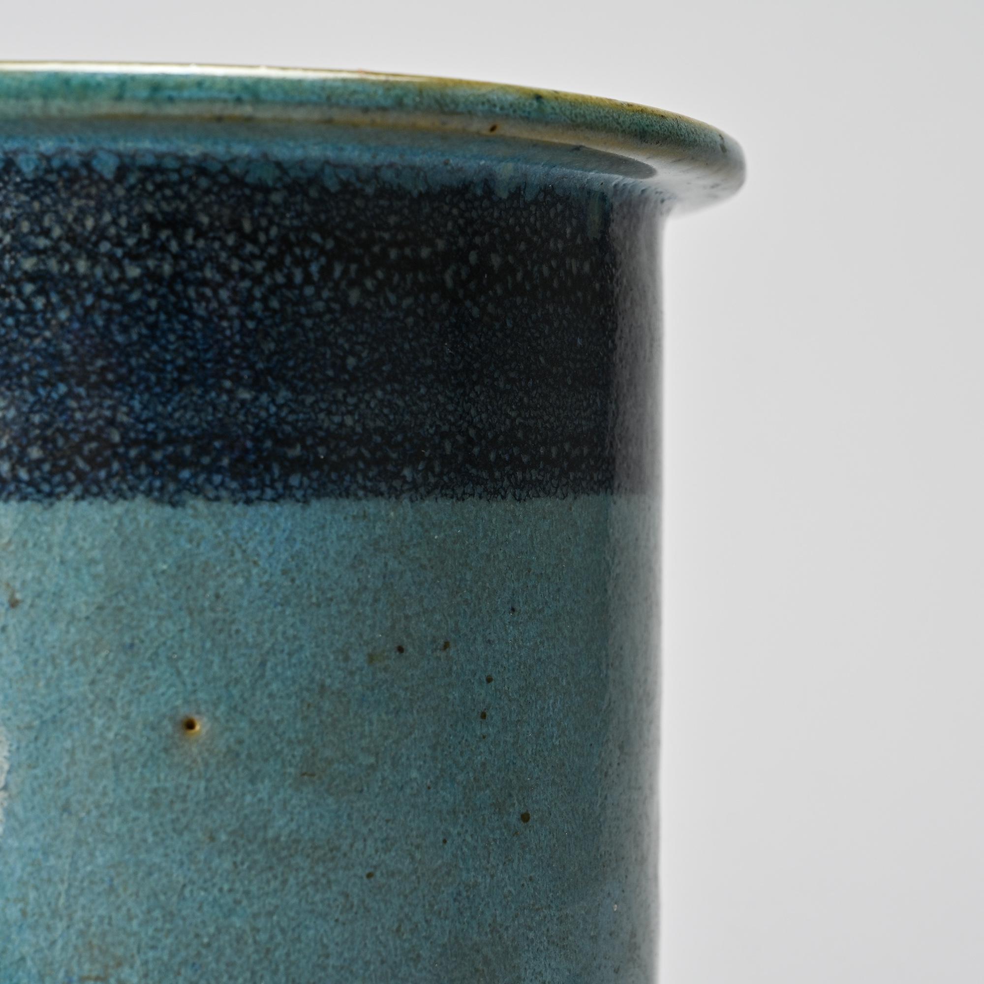 Small glazed ceramic pot by Menelika pottery, circa 1950.
