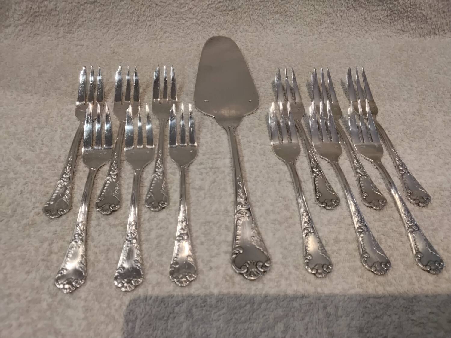 12 cake forks, pie server, silversmith Frionnet Dubarry