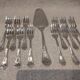 12 cake forks, pie server, silversmith Frionnet Dubarry