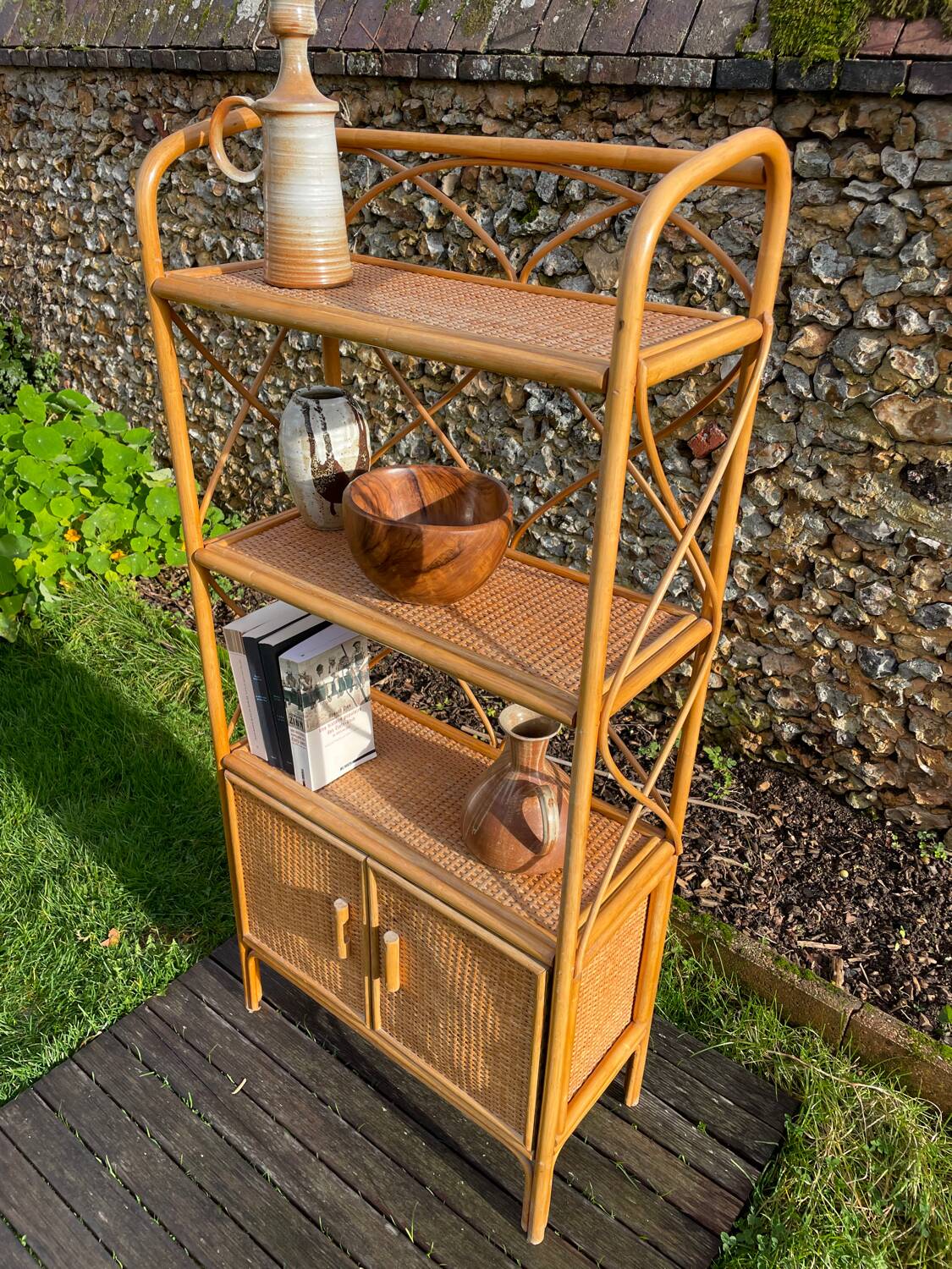 Honey-colored rattan shelf 🍯
