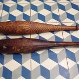2 old wooden juggling clubs